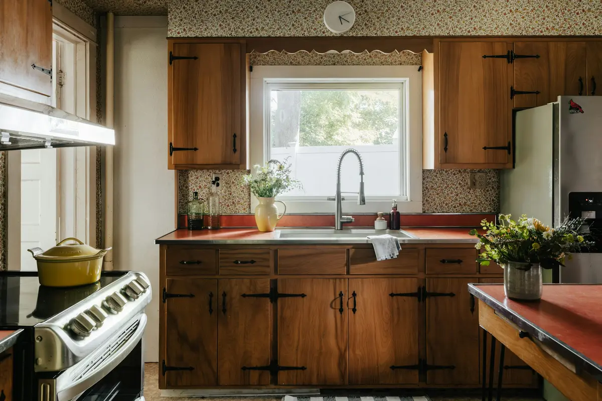 Original wood kitchen with a window over the sink