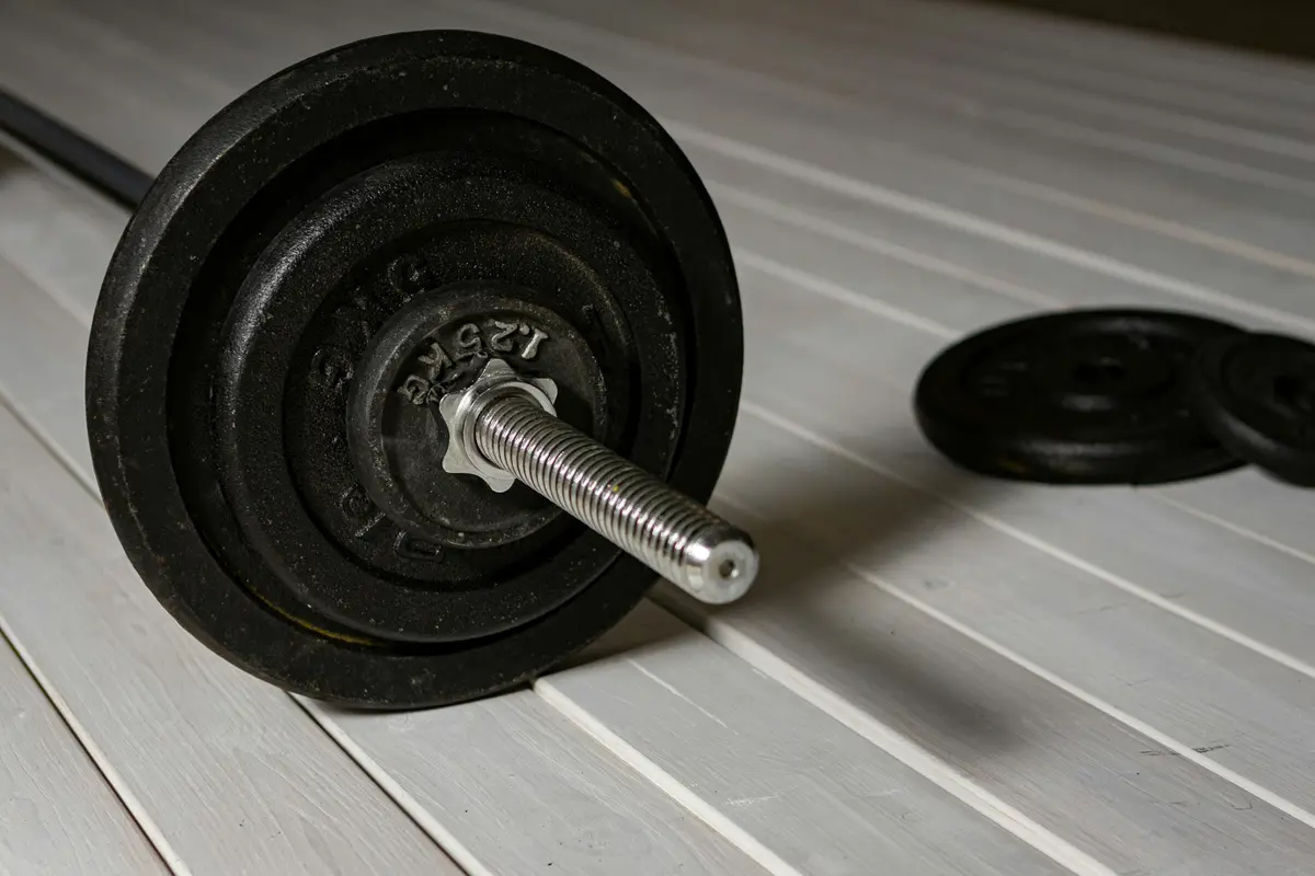 A close-up of an iron plate on a bar