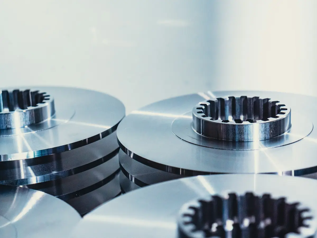 A stack of freshly machined metal discs